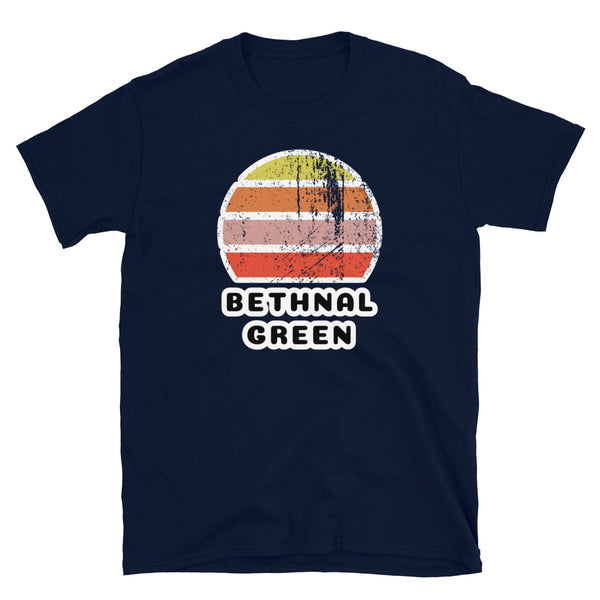 Vintage distressed style retro sunset in yellow, orange, pink and scarlet with the London neighbourhood of Bethnal Green beneath on this navy cotton t-shirt