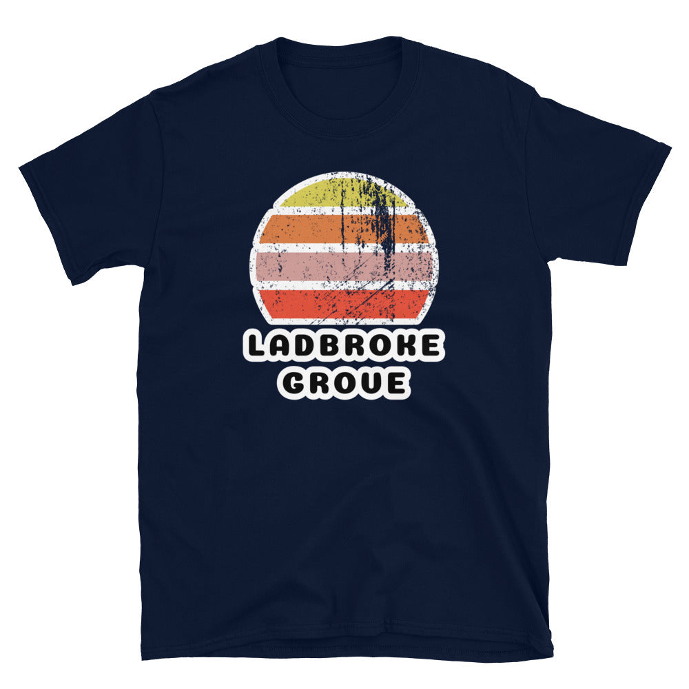 Vintage distressed style retro sunset in yellow, orange, pink and scarlet with the London neighbourhood of Ladbroke Grove beneath on this navy cotton t-shirt