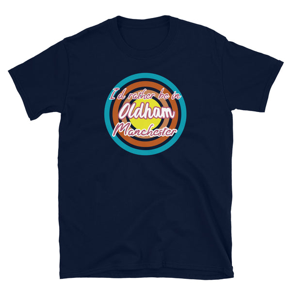 Oldham Manchester urban city vintage style graphic in turquoise, orange, pink and yellow concentric circles with the slogan I'd rather be in Oldham Manchester across the front in retro vintage style font on this navy cotton t-shirt