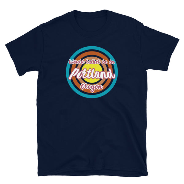 Rather be in Portland Oregon graphic t-shirt design with concentric circles in retro colours of blue, orange, pink and yellow on this navy cotton tee by BillingtonPix