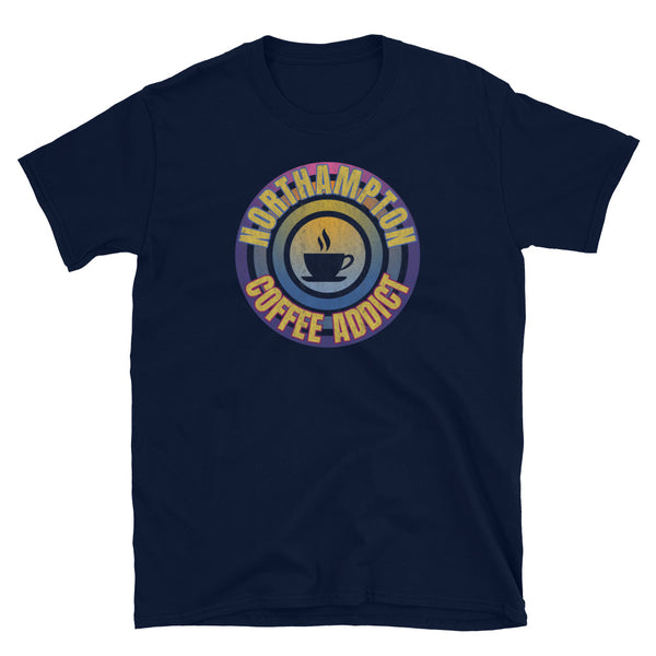 Concentric circular design of retro 80s metallic colours and the slogan Northampton Coffee Addict with a coffee cup silhouette in the centre. Distressed and dirty style image for a vintage Retrowave look on this navy cotton t-shirt by BillingtonPix