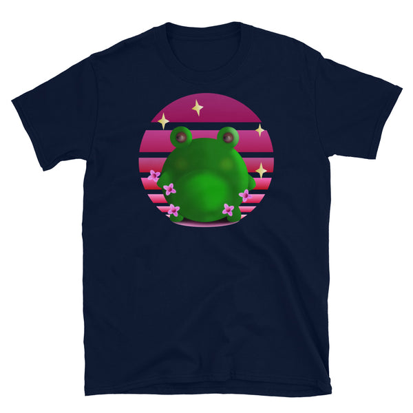Grumpy green frog stands in front of a pink / purple vintage sunset with blossom and stars on this navy cotton graphic t shirt by BillingtonPix 