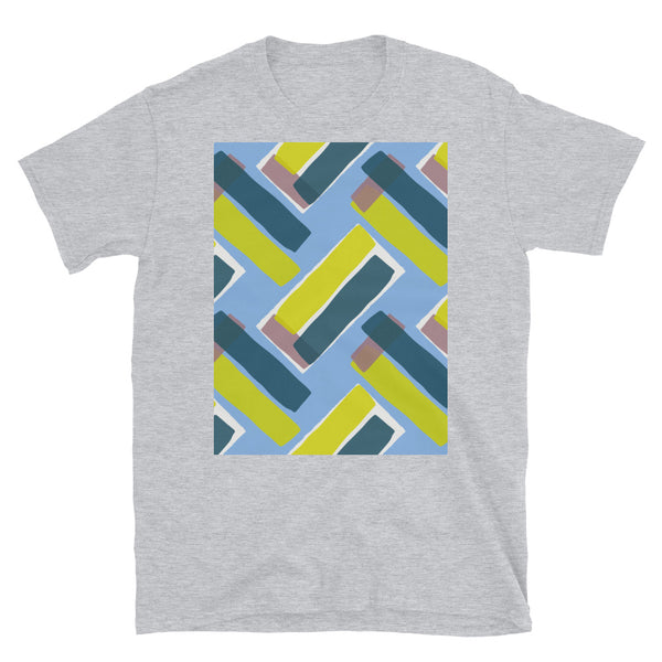 The vintage style graphic design printed on the front of this tee consists of diagonal color blocks in an alternating criss-cross format on a cerulean blue background