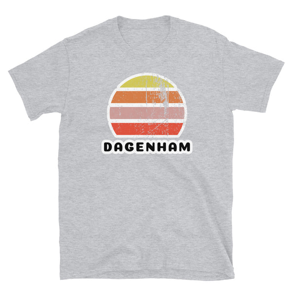 Vintage retro sunset in yellow, orange, pink and scarlet with the name Dagenham beneath on this sport grey t-shirt