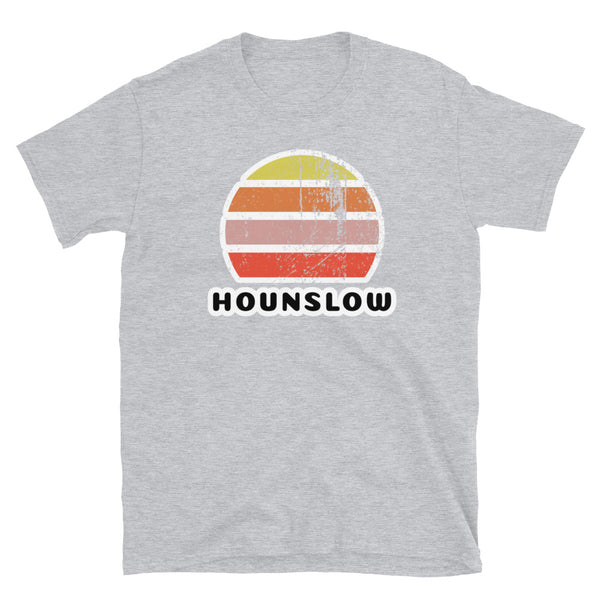 Vintage retro sunset in yellow, orange, pink and scarlet with the name Hounslow beneath on this sport grey t-shirt