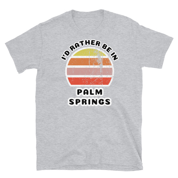 Vintage distressed style abstract retro sunset in yellow, orange, pink and scarlet with the words I'd Rather Be In above and the name Palm Springs beneath on this sport grey  t-shirt