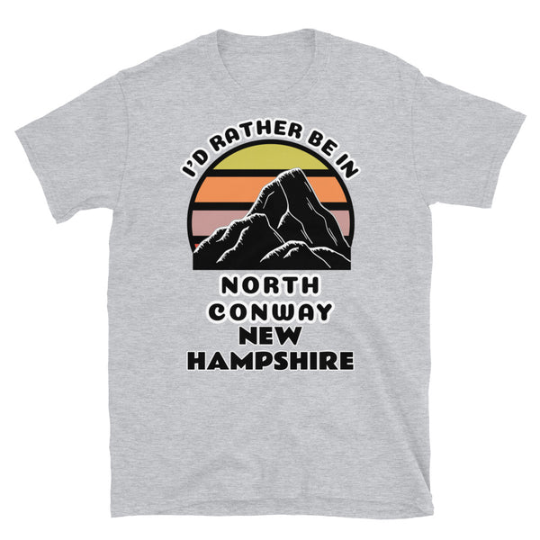 North Conway New Hampshire vintage sunset mountain scene in silhouette, surrounded by the words I'd Rather Be In on top and North Conway New Hampshire below on this light grey cotton t-shirt