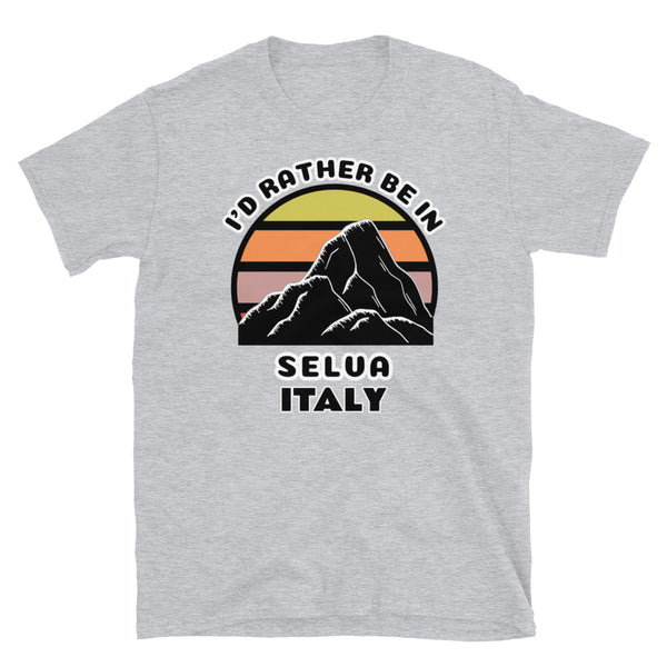 Selva Italy vintage sunset mountain scene in silhouette, surrounded by the words I'd Rather Be In on top and Selva, Italy below on this light grey cotton ski and mountain themed t-shirt