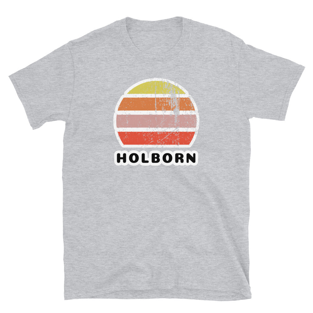 Vintage distressed style retro sunset in yellow, orange, pink and scarlet with the London neighbourhood of Holborn beneath on this light grey cotton t-shirt