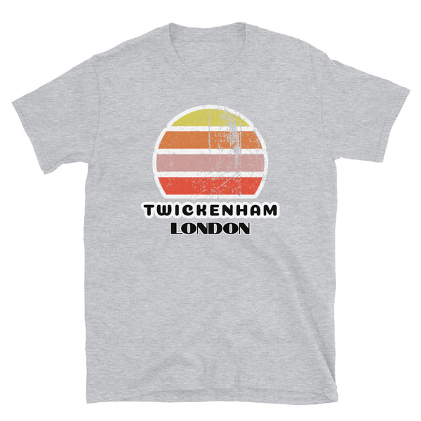 Vintage distressed style retro sunset in yellow, orange, pink and scarlet with the London neighbourhood of Twickenham outlined beneath on this light grey cotton t-shirt