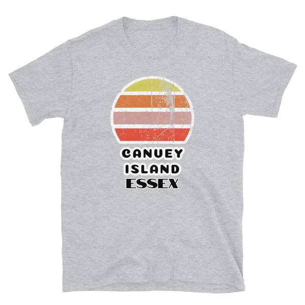 Vintage distressed style retro sunset in yellow, orange, pink and scarlet with Canvey Island in Essex outlined beneath on this light grey cotton t-shirt