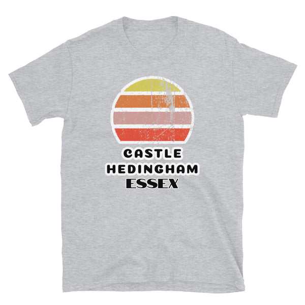 Vintage distressed style retro sunset in yellow, orange, pink and scarlet with the Essex village of Castle Hedingham outlined beneath on this light grey cotton t-shirt
