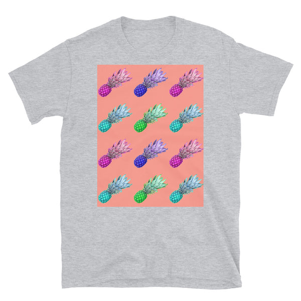 Brightly coloured pineapples in a diagonal formation against a peach background on this light grey cotton t-shirtt