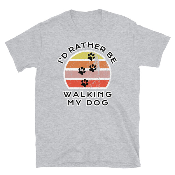 I'd Rather Be In Walking My Dog T-Shirt with a dog paw prints image and a vintage sunset distressed style graphic design on this light grey cotton dog t-shirt