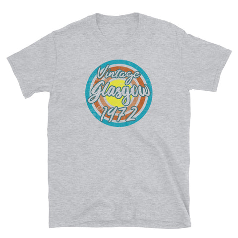 Vintage Glasgow Est. 1972 retro vintage distressed style design in turquoise, orange, pink and yellow tones for birthday gift ideas on this light grey cotton t-shirt