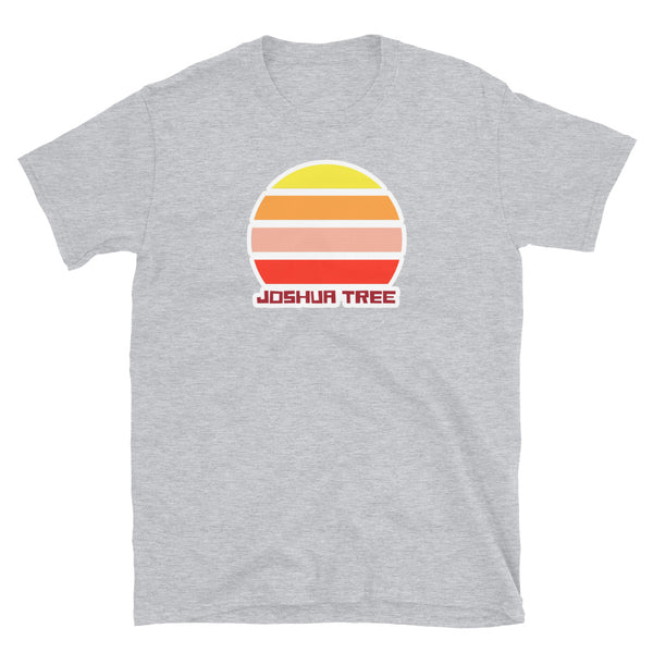 Joshua Tree California vintage sunset graphic t-shirt with a striped sun in yellow, orange, pink and scarlet and the name Joshua Tree underneath on this light grey t-shirt