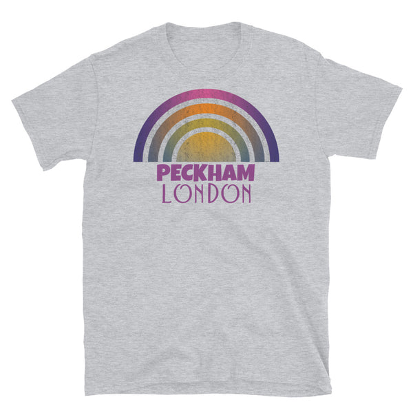 Retrowave 80s style graphic vintage sunset design t shirt depicting the London neighbourhood of Peckham on this light grey cotton t-shirt