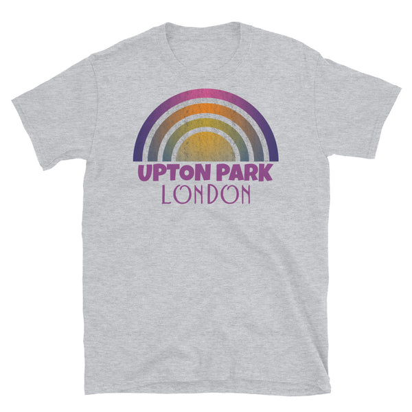 Retrowave 80s style graphic vintage sunset design t shirt depicting the London neighbourhood of Upton Park on this light grey cotton t-shirt