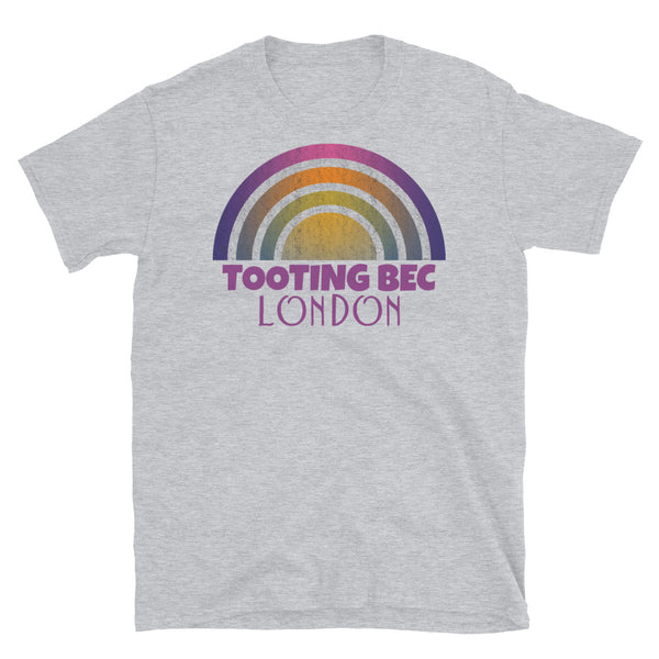 Retrowave and Vaporwave 80s style graphic vintage sunset design tee depicting the London neighbourhood of Tooting Bec on this light grey cotton t-shirt