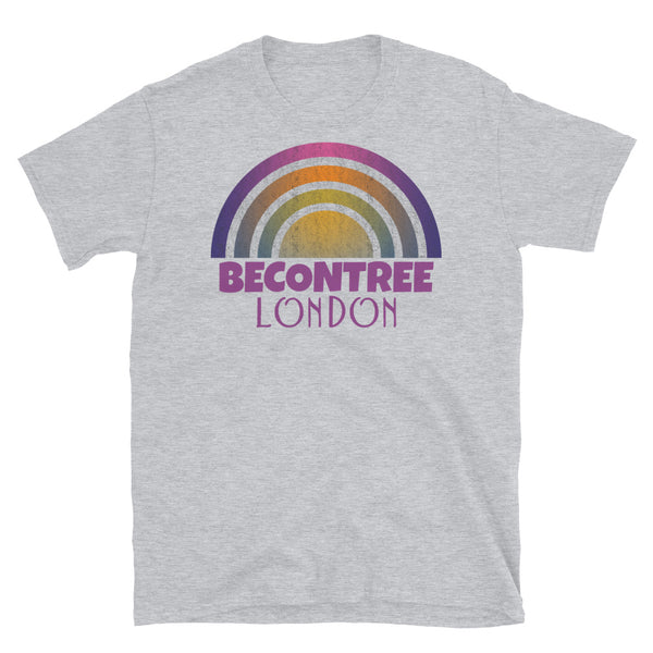 Retrowave and Vaporwave 80s style graphic vintage sunset design tee depicting the London neighbourhood of Becontree on this light grey cotton t-shirt