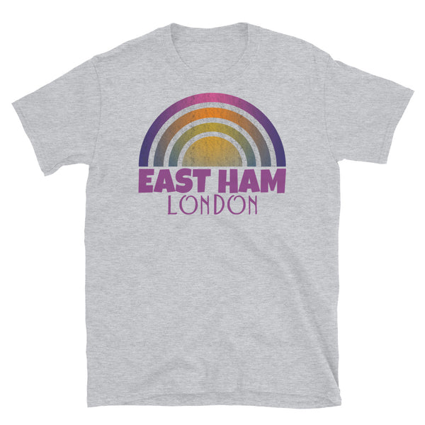 Retrowave and Vaporwave 80s style graphic vintage sunset design tee depicting the London neighbourhood of East Ham on this light grey cotton t-shirt