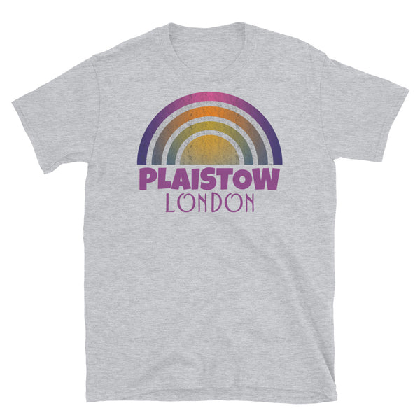 Retrowave and Vaporwave 80s style graphic gritty vintage sunset design tee depicting the London neighbourhood of Plaistow on this light grey souvenir cotton t-shirt