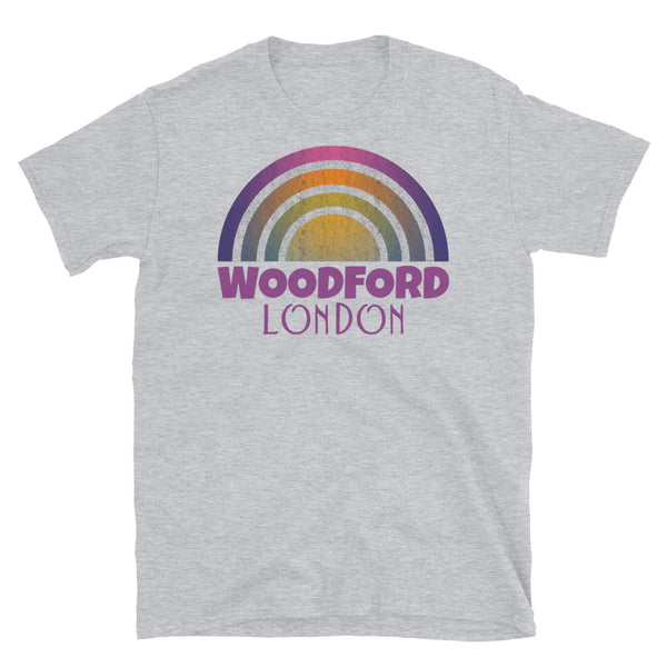 Retrowave and Vaporwave 80s style graphic gritty vintage sunset design tee depicting the London neighbourhood of Woodford on this light grey souvenir cotton t-shirt