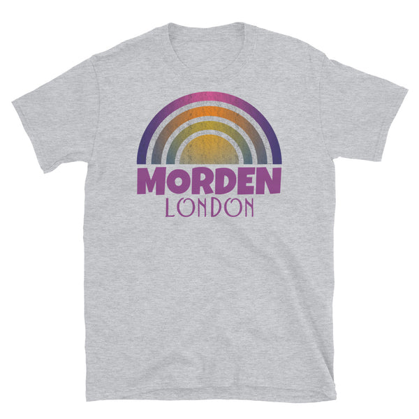 Retrowave and Vaporwave 80s style graphic gritty vintage sunset design tee depicting the London neighbourhood of Morden on this light grey souvenir cotton t-shirt