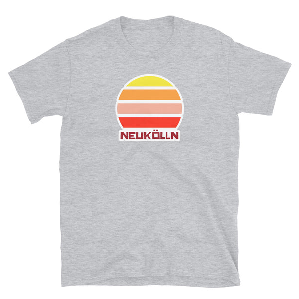 Neukölln Berlin LGBT themed t-shirt with a vintage sunset graphic in yellow, orange, pink and scarlet and the place name Kreuzberg beneath on this light grey cotton t-shirt by BillingtonPix