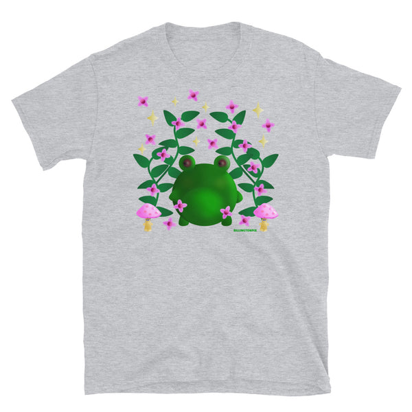 Cute kawaii green frog in this Cottagecore asesthetic graphic design. Features green leaves, pink blossom, grumpy mushrooms and stars in the sky on this light grey cotton t-shirt by BillingtonPix