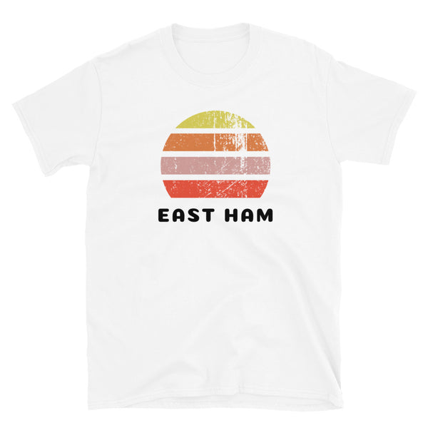 Vintage retro sunset in yellow, orange, pink and scarlet with the name East Ham beneath on this white t-shirt