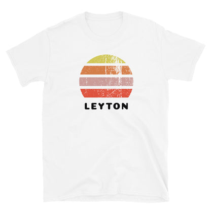 Vintage retro sunset in yellow, orange, pink and scarlet with the name Leyton beneath on this white t-shirt