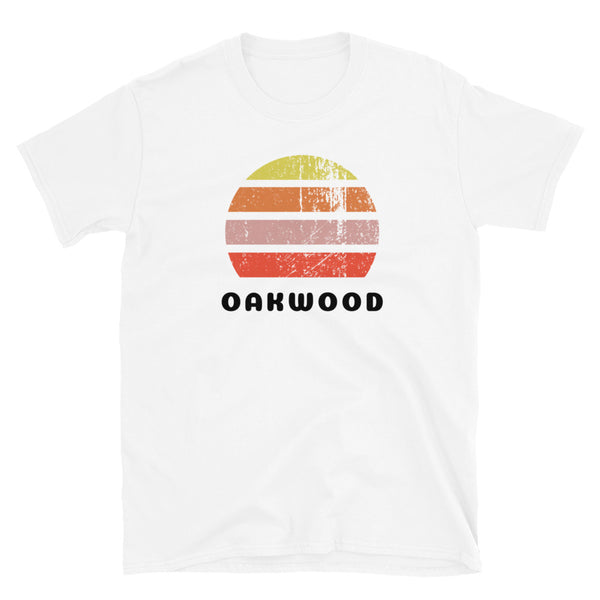 Vintage distressed style abstract retro sunset in yellow, orange, pink and scarlet with the name Oakwood beneath on this white t-shirt