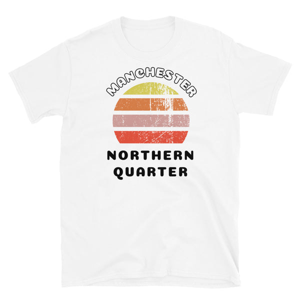 Distressed style abstract retro sunset graphic in yellow, orange, pink and scarlet stripes. The name of Manchester is displayed at the top wrapped around the sunset. Below the retro sunset design is the famous Manchester place name of Northern Quarter on this white cotton t-shirt.