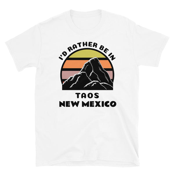 Taos New Mexico vintage sunset mountain scene in silhouette, surrounded by the words I'd Rather Be In on top and Taos New Mexico below on this white cotton t-shirt