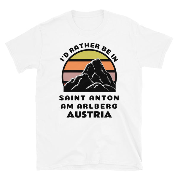 Saint Anton am Arlberg Austria vintage sunset mountain scene in silhouette, surrounded by the words I'd Rather Be In on top and Saint Anton am Arlberg, Austria below on this white cotton ski and mountain themed t-shirt