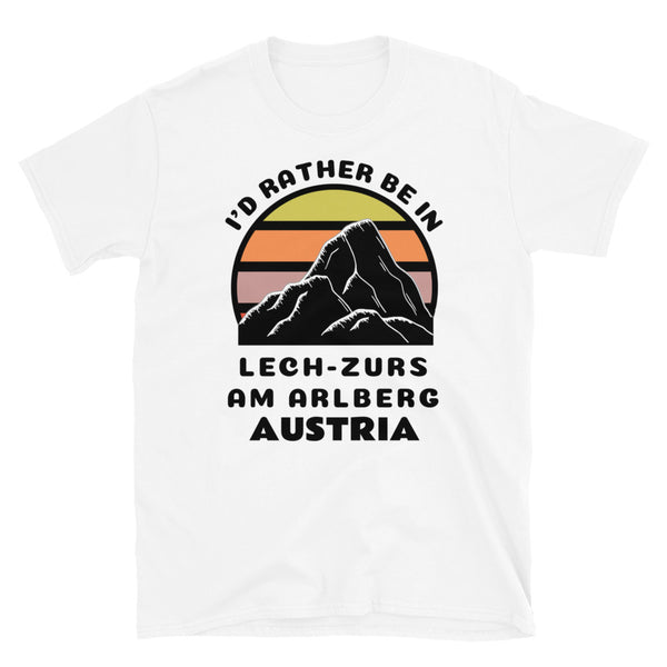 Lech-Zürs am Arlberg Austria vintage sunset mountain scene in silhouette, surrounded by the words I'd Rather Be In on top and Lech-Zürs am Arlberg, Austria below on this white cotton ski and mountain themed t-shirt