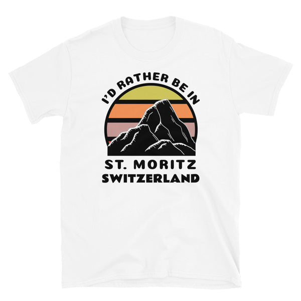 St. Moritz Switzerland vintage sunset mountain scene in silhouette, surrounded by the words I'd Rather Be In on top and Saint Moritz, Switzerland below on this white cotton ski and mountain themed t-shirt