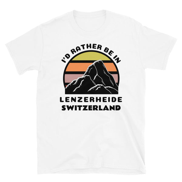 Lenzerheide Switzerland vintage sunset mountain scene in silhouette, surrounded by the words I'd Rather Be In on top and Lenzerheide, Switzerland below on this white cotton ski and mountain themed t-shirt