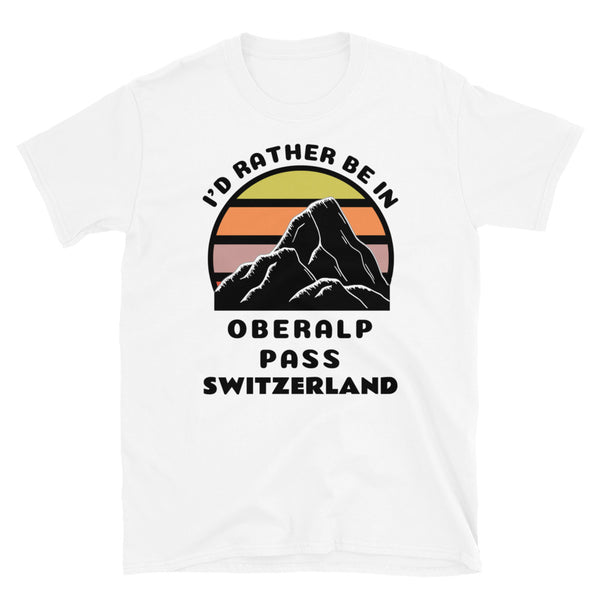 Oberalp Pass Switzerland vintage sunset mountain scene in silhouette, surrounded by the words I'd Rather Be In on top and Oberalp Pass, Switzerland below on this white cotton ski and mountain themed t-shirt