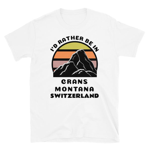Crans-Montana Switzerland vintage sunset mountain scene in silhouette, surrounded by the words I'd Rather Be In on top and Crans Montana, Switzerland below on this white cotton ski and mountain themed t-shirt