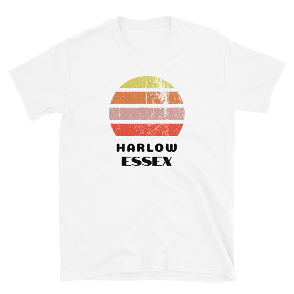 Vintage distressed style retro sunset in yellow, orange, pink and scarlet with the Essex town of Harlow outlined beneath on this white cotton t-shirt