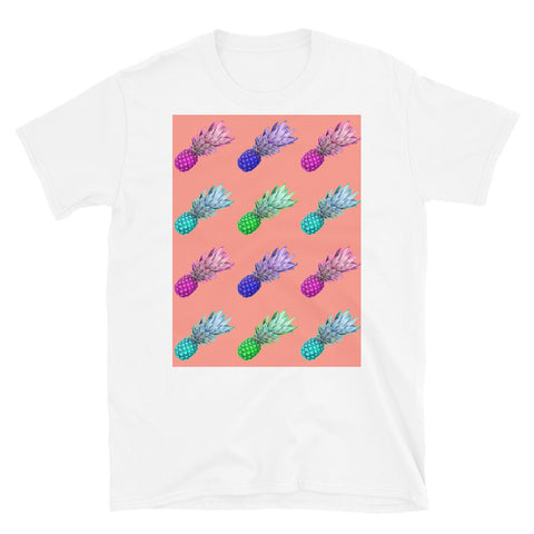 Brightly coloured pineapples in a diagonal formation against a peach background on this white cotton t-shirtt
