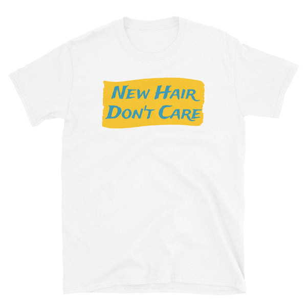Funny slogan New Hair Don't Care in turquoise font on a splash of orange colour on this white cotton tee