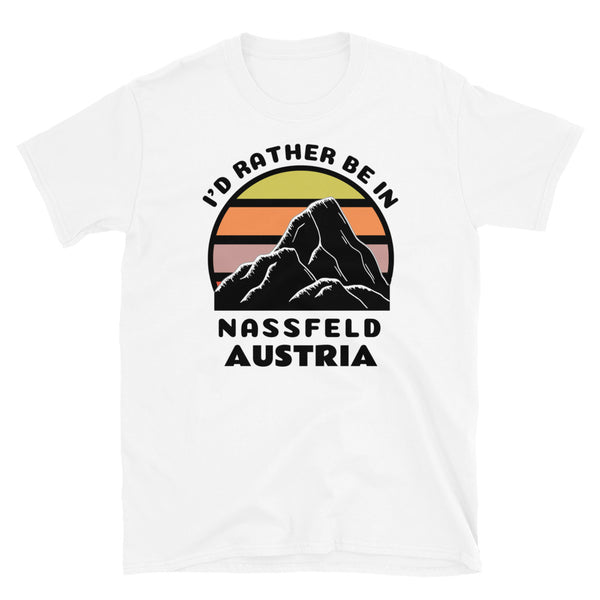 Nassfeld Austria vintage sunset mountain scene in silhouette, surrounded by the words I'd Rather Be In on top and Nassfeld, Austria below on this white cotton ski and mountain themed t-shirt