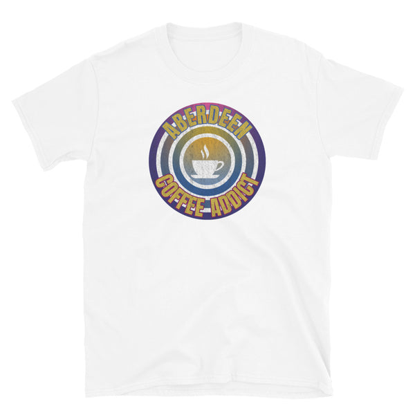 Concentric circular design of retro 80s metallic colours and the slogan Aberdeen Coffee Addict with a coffee cup silhouette in the centre. Distressed and dirty style image for a vintage Retrowave look on this white cotton t-shirt by BillingtonPix