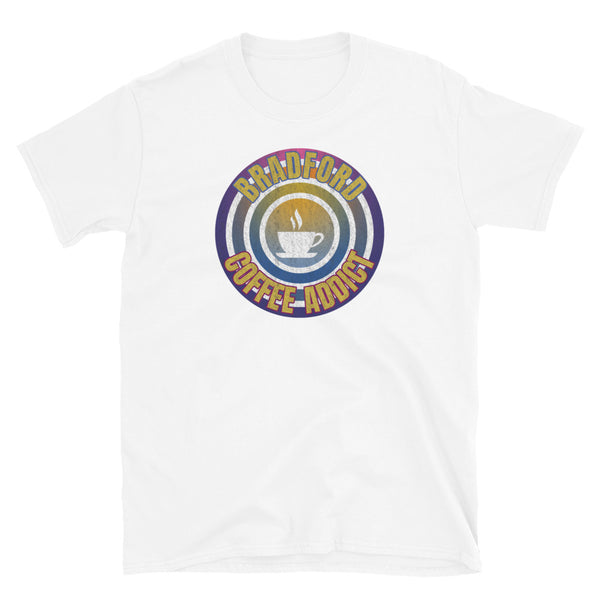 Concentric circular design of retro 80s metallic colours and the slogan Bradford Coffee Addict with a coffee cup silhouette in the centre. Distressed and dirty style image for a vintage Retrowave look on this white cotton t-shirt by BillingtonPix