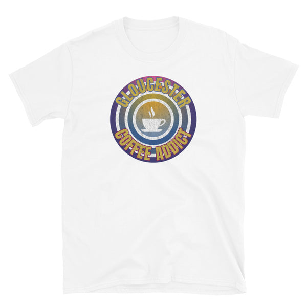 Concentric circular design of retro 80s metallic colours and the slogan Gloucester Coffee Addict with a coffee cup silhouette in the centre. Distressed and dirty style image for a vintage Retrowave look on this white cotton t-shirt by BillingtonPix