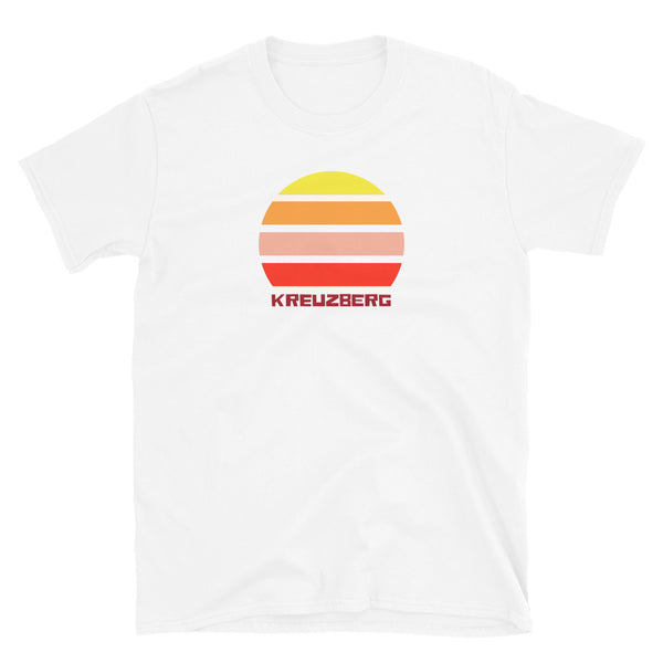 Kreuzberg Berlin LGBT themed t-shirt with a vintage sunset graphic in yellow, orange, pink and scarlet and the place name Kreuzberg  beneath on this white cotton t-shirt by BillingtonPix