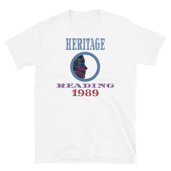 Graphic t-shirt with a patterned profile face in abstract design, tones of blue, green, purple, red, in circular format, with the words Heritage Reading 1989 in blue, purple and red on this white cotton t-shirt by BillingtonPix